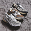 New Balance 990 kengät kolmessa eri värissä